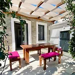 Holiday home Svolis Townhouse - Urban Oasis With Pool & Garden